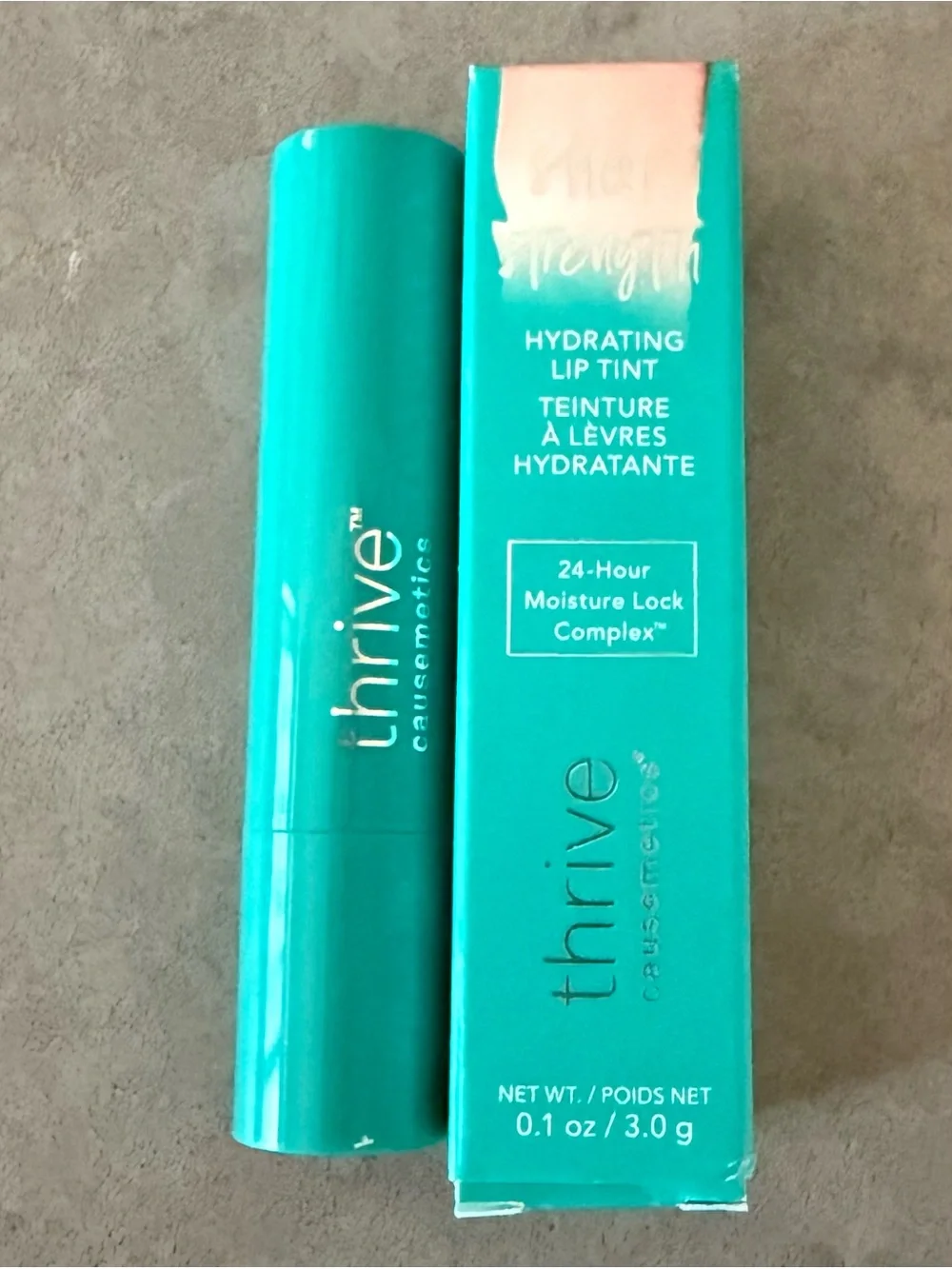 thrive causemetics Sheer Strength Hydrating Lip Tint in Amy Peach Pink Shimmer